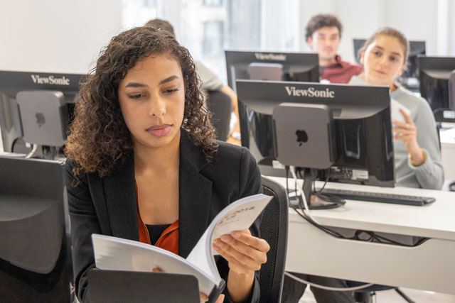 Student taking advantage of supplementary course materials